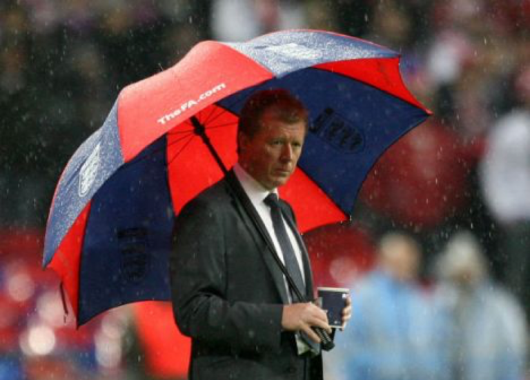 Steve McClaren with an umbrella